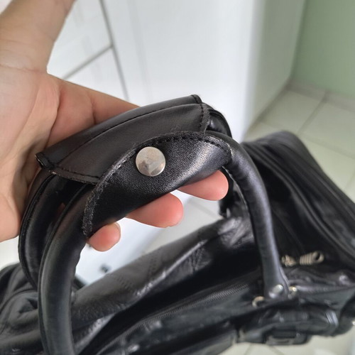 Travel bag like new, black, synthetic leather with extra strap