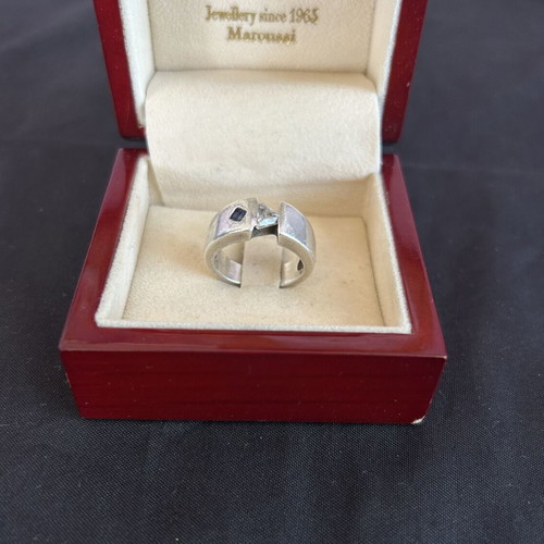Silver 950 ring used with white and blue stone