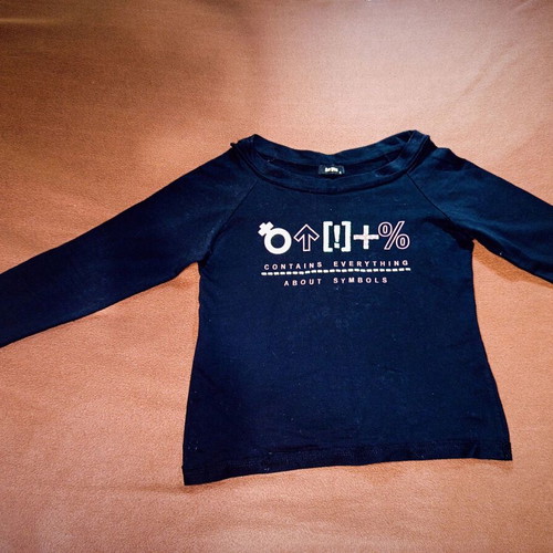 Be You black blouse used with graphic print and symbols