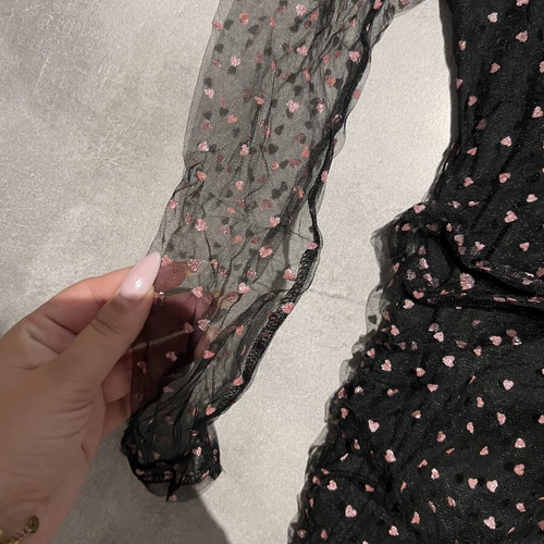 Black mini dress with pink hearts and transparent sleeve, like new