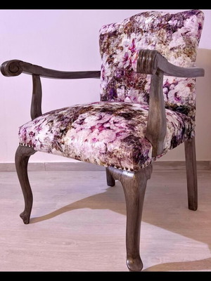 Handmade vintage armchair like new with carved design and painted fabric