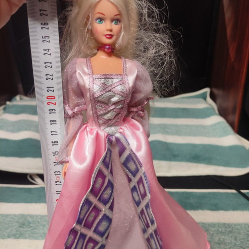 Doll with beautiful dress used