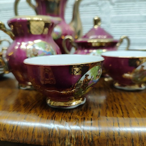 Porcelain coffee set used, 15 pieces, burgundy-fuchsia with gold details