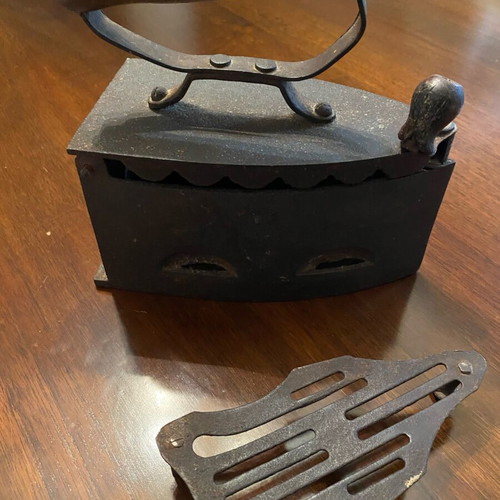 Antique charcoal iron used, cast iron with wooden handle