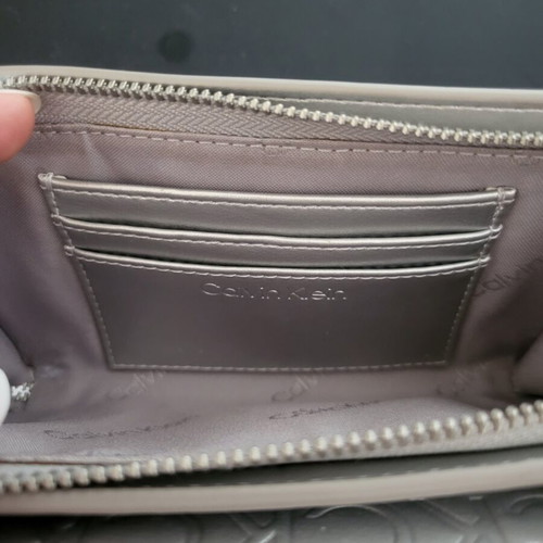 Calvin Klein silver bag like new with logo