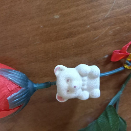 Decorative rose with small bear, plastic