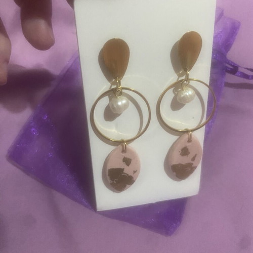 Women's earrings new, pink gold color