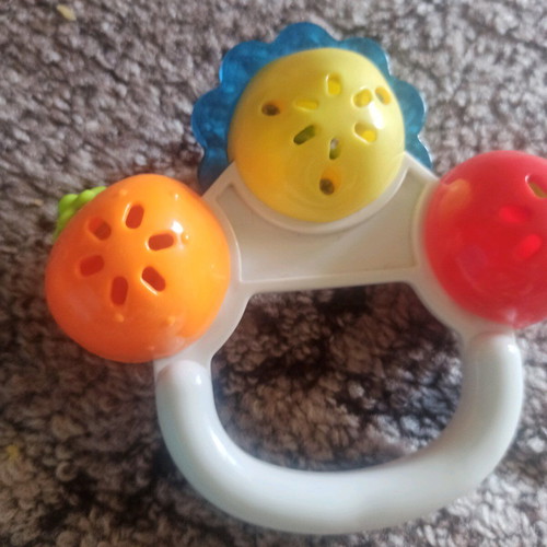 Teether and rattle with handle