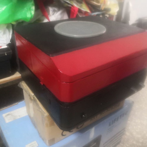 Red Garrard collectible pick up used with built-in speaker