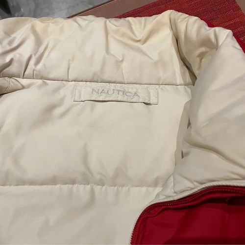 Nautica sleeveless jacket double sided XL like new, down and feather