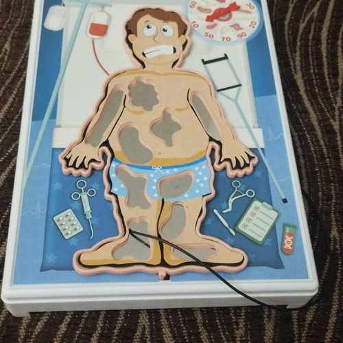 The Little Doctors board games used, pack of 2 with sound and missing parts