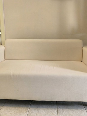 IKEA sofa cream color used, two-seater with orange cover