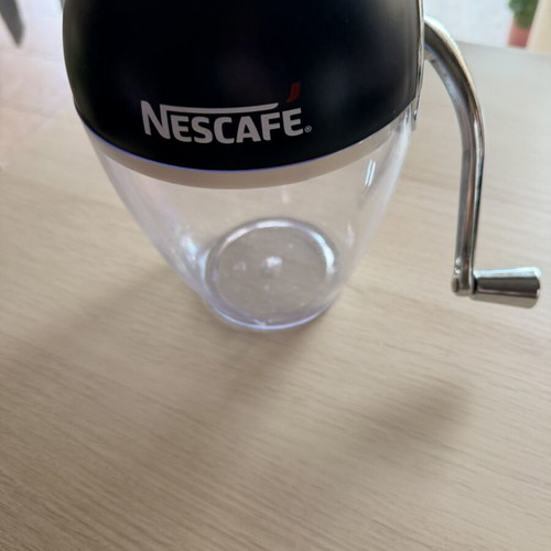 Nescafé manual ice crusher used, one lid ear broken