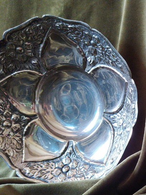 Vintage silver-plated fondue dish used with floral decoration