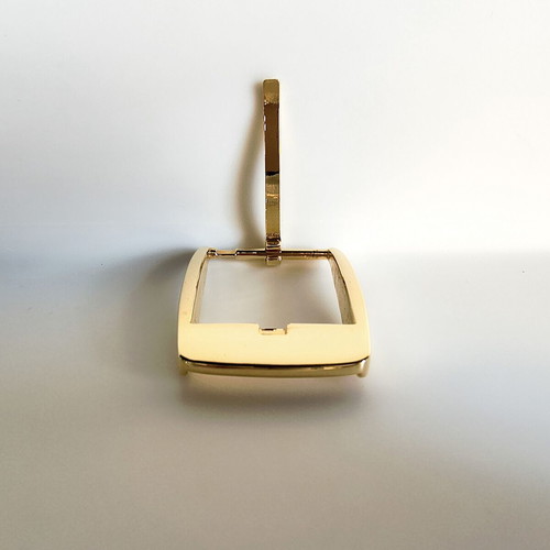 Metal belt buckle with tongue, gold color