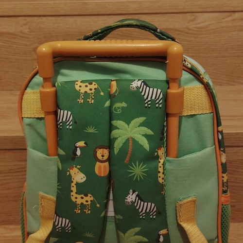 Toddler bag with jungle animals like new, wheels and foldable handle