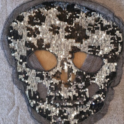 Beige cardigan with skull like new