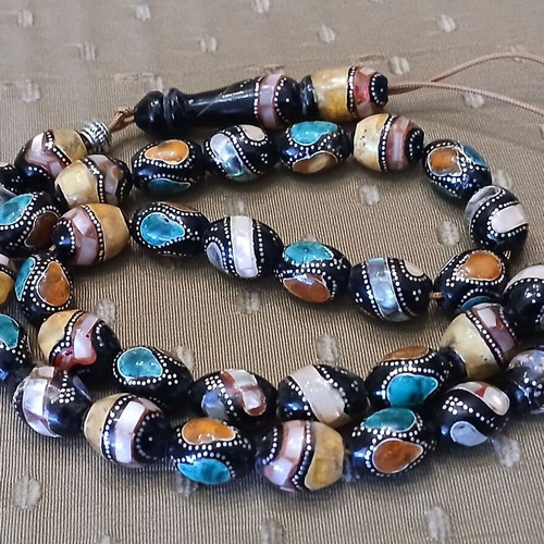 Yiousouri Worry Beads used with amber, mother-of-pearl and silver embroidery