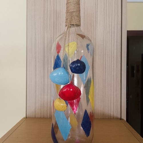 Handmade summer decorative bottle with seashells