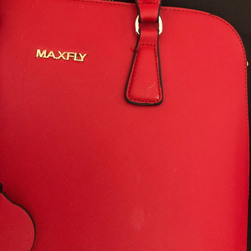 Red handbag used with wear marks