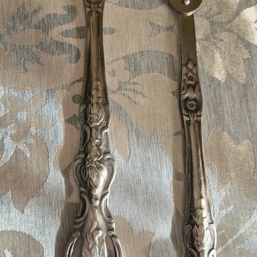 Vintage pierced spoon and fork set with ornate handle like new