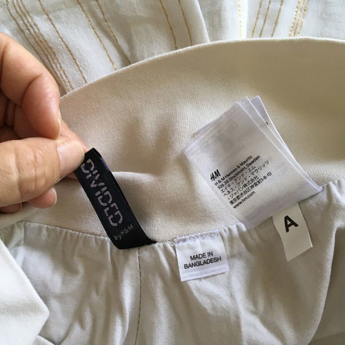 H&M white cotton mini skirt like new with gold stripes