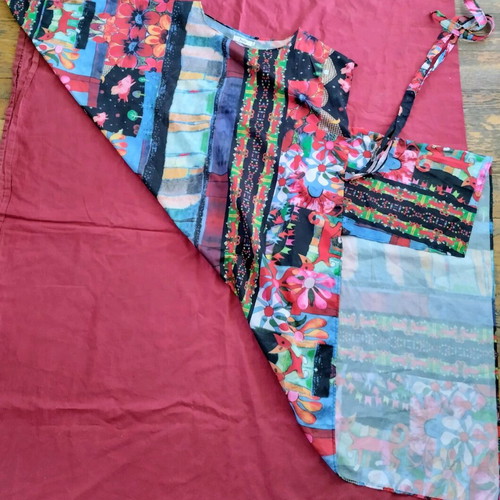 Slanted women's tunic blouse used, size medium, with belt