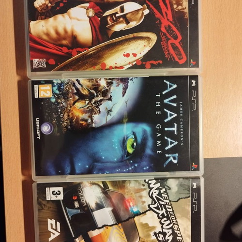 PlayStation Portable (PSP) 1004k Value Pack used with 3 games and manual