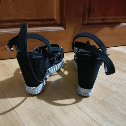 Platform shoes used with studs and double ankle strap