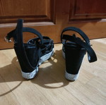 Platform shoes used with studs and double ankle strap
