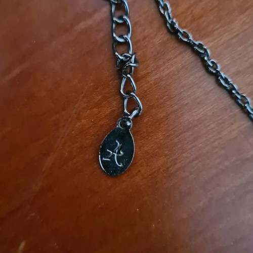 Silver-colored necklace with black stones unused from Accessorize