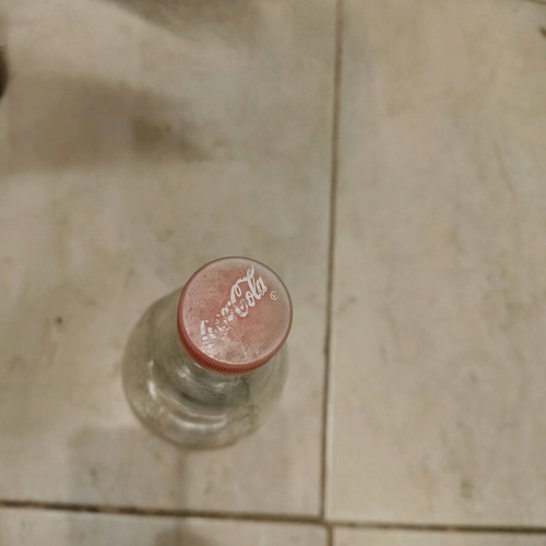 Coca-Cola bottle French like new with original cap