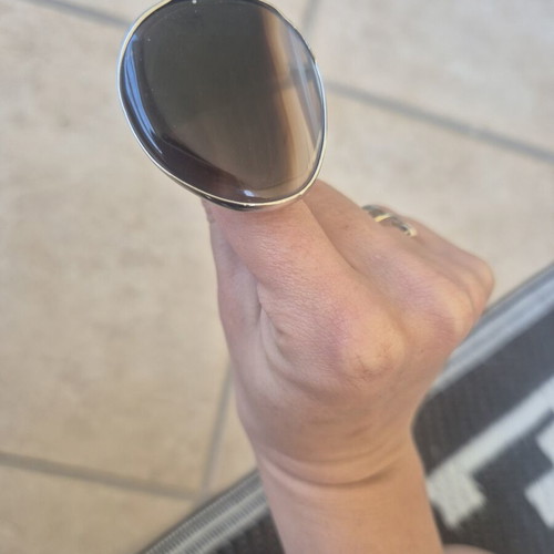 Adjustable ring like new, brown