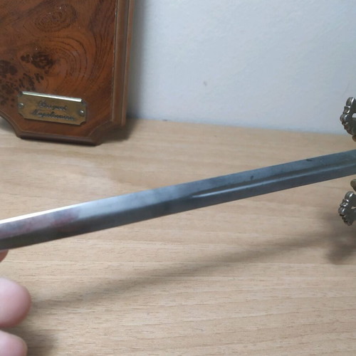 Decorative wall miniature sword used