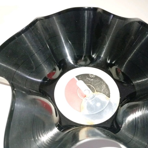 Bowl made from vinyl record used, asymmetrical