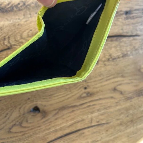 Axel wallet used in bright lime color