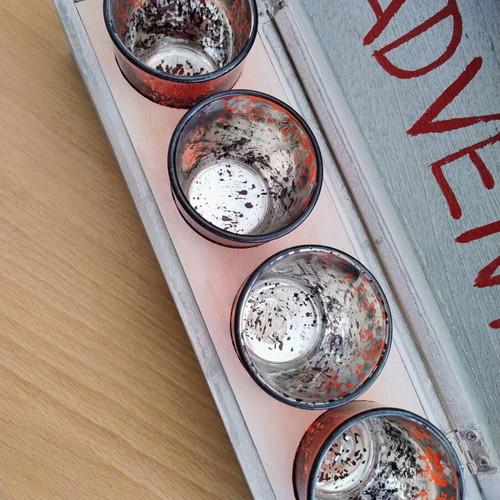 Wooden box with four tealight candle holders