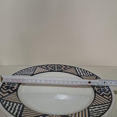 Vintage dinnerware set of 7 pieces with geometric black and brown pattern, like new