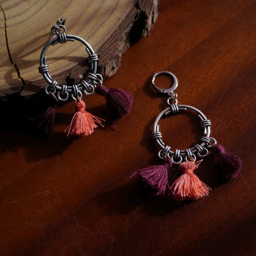 Handmade hanging earrings new with pink and purple tassels