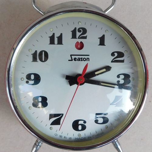 Metal wind-up vintage alarm clock