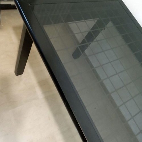 Black modern dining table like new, solid wood with smoked glass top