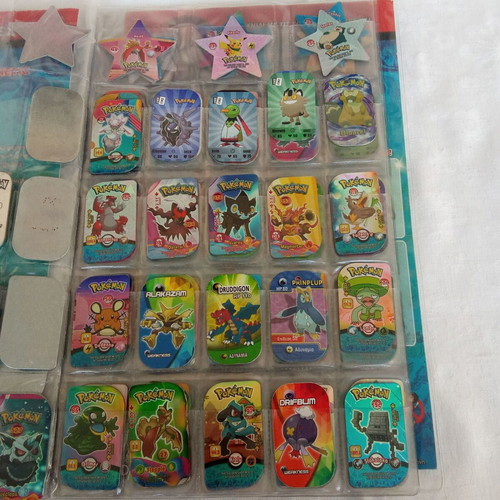 Collectible album with 132 Pokemon metal tags