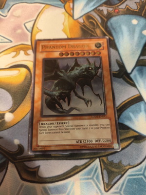 Phantom Dragon Yu-Gi-Oh card used, damaged condition, Ultimate Rare