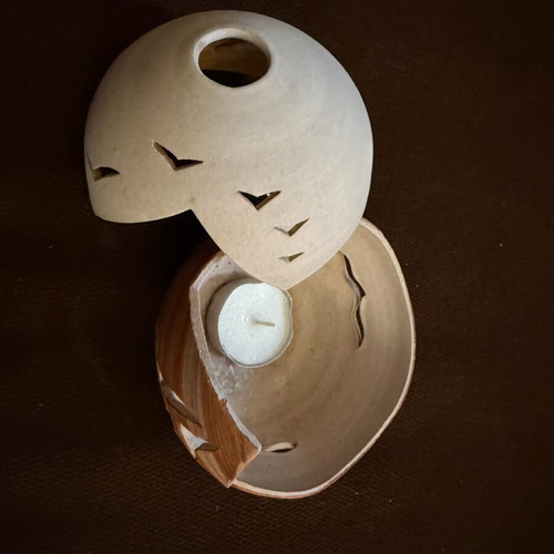 Handmade ceramic lantern with sailboat design, tealight holder