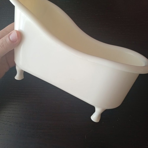 Decorative plastic vintage bathtub organizer used