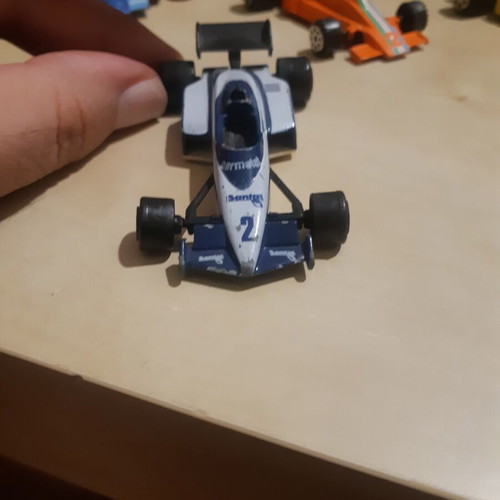 Majorette F1 Brabham 1984 with 3 vintage F1 toy cars