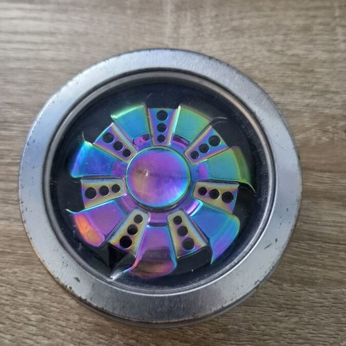 Burned titanium stress relief spinner