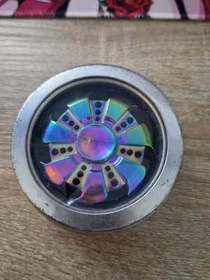 Burned titanium stress relief spinner