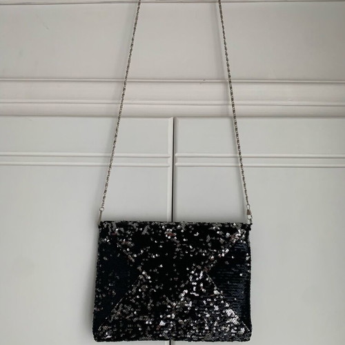 Evening hand bag new with black and silver sequins