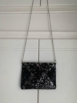 Evening hand bag new with black and silver sequins